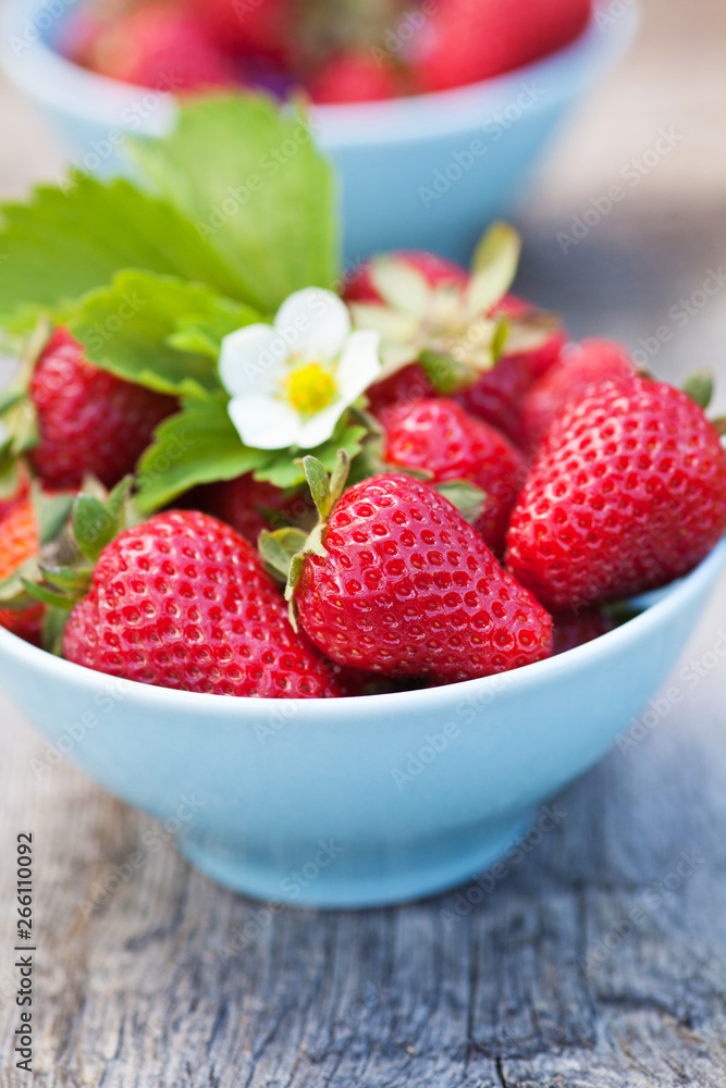Fresh sweet strawberries in the bowl, selective focus Fresh sweet strawberries in the bowl, selective focus