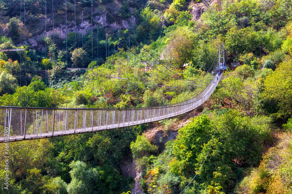 Suspension bridge over the gorge leading to Khndzoresk cave settlement, Syunik region, Armenia Suspension bridge over the gorge leading to Khndzoresk cave settlement, Syunik region, Armenia