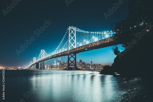 San Francisco skyline with Oakland Bay Bridge in twilight, California, USA photo