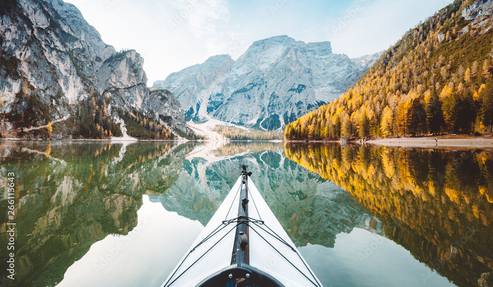 Kayak on alpine lake in fall - obrazy, fototapety, plakaty 