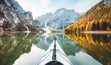 Kayak on alpine lake in fall
