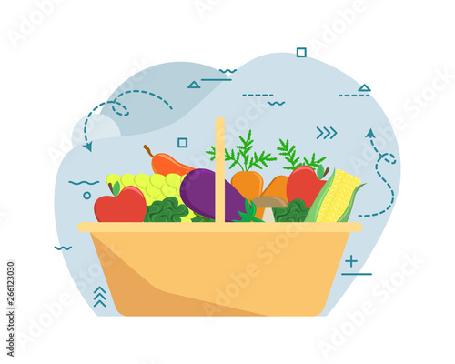 Basket with autumn harvest. Farm fruits and vegetables.
