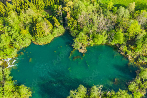 Aerial view of beautiful secret pond on Mreznica river in Croatia, nature landscape