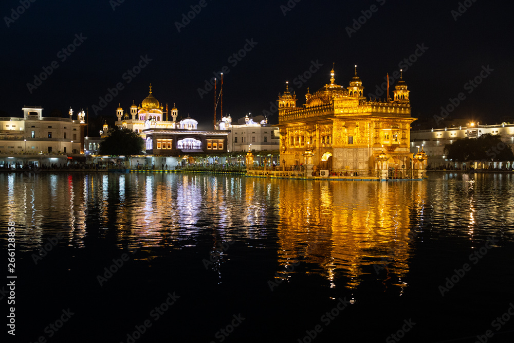 Night view to the Golden temple (Harmandir sahib) with reflection in Amritsar, Punjab, India