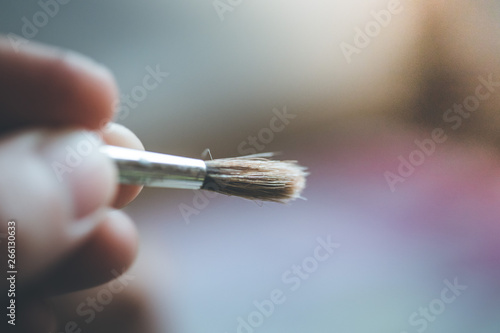 Painting artwork: paint brushes on painting background