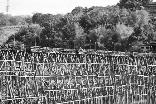 Close-up view, large wooden bridge Long and large at Sangkhla Buri District, Kanchanaburi Province, Thailand photo