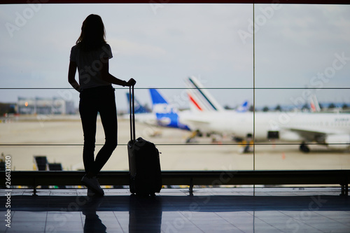 Young woman in international airport photo