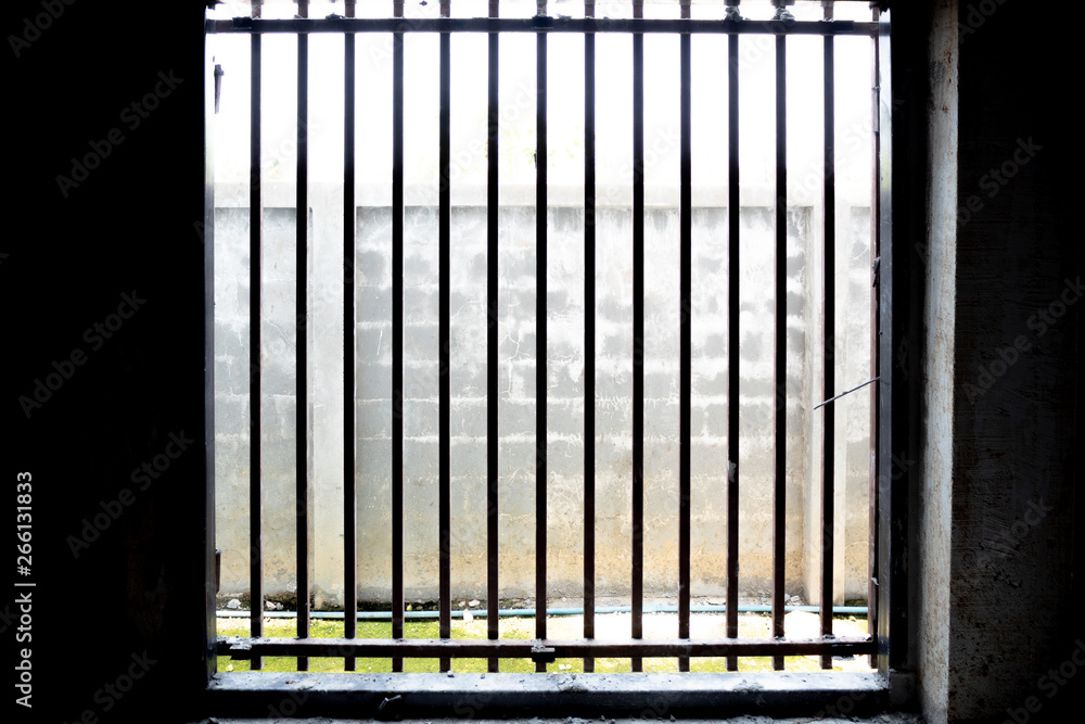 The sunlight form outside of cage door for background, wallpaper