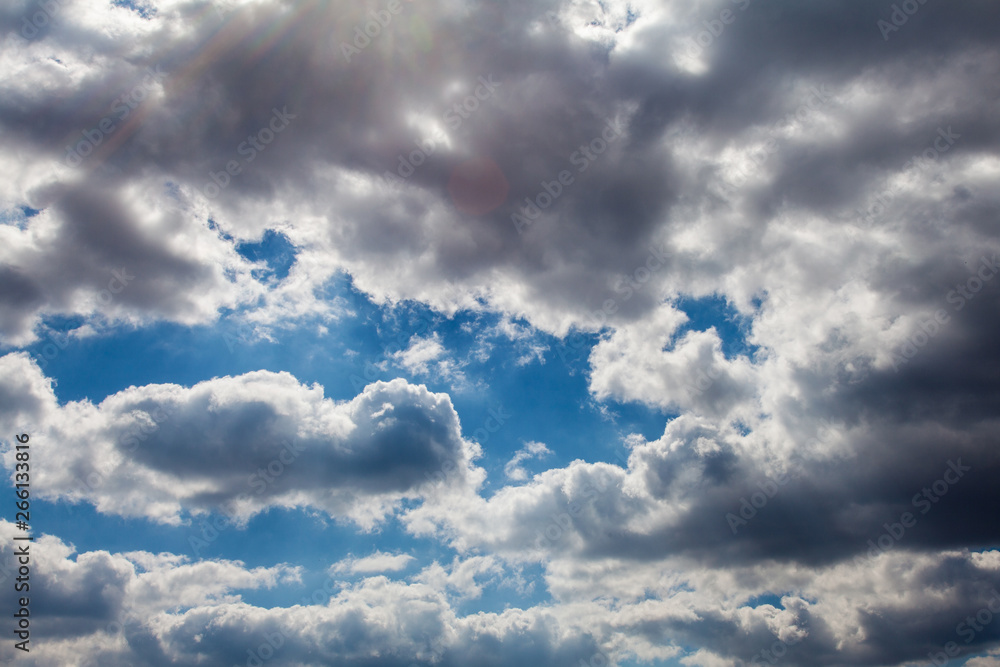 Fototapeta premium Spring evening sky in the picturesque clouds