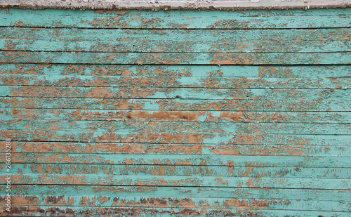 background of wooden wall with peeling paint