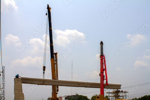 Crane work in the construction site.