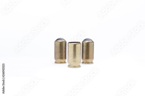 Wallpaper Mural Ammunition for traumatic weapons. Three bullets with a rubber bullet. Torontodigital.ca