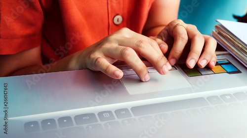 Woman using a labtop computer background
