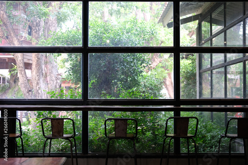 stool in cafe coffee shop near garden window