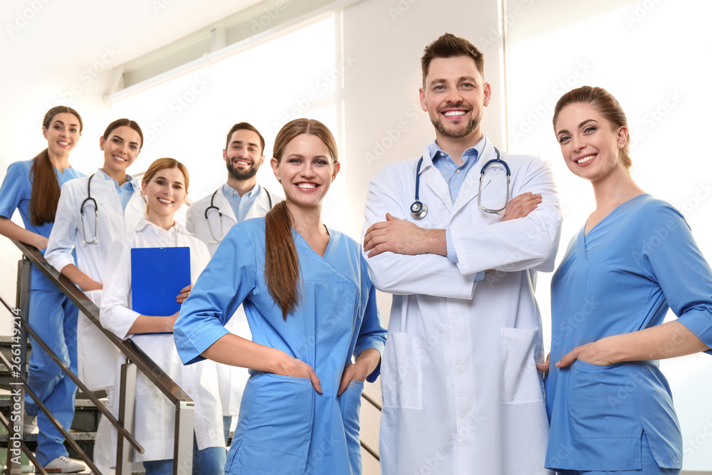 Group of medical doctors at clinic. Unity concept Group of medical doctors at clinic. Unity concept