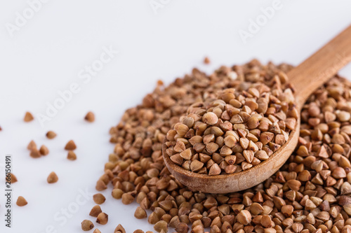 Grain buckwheat on a white acrylic background