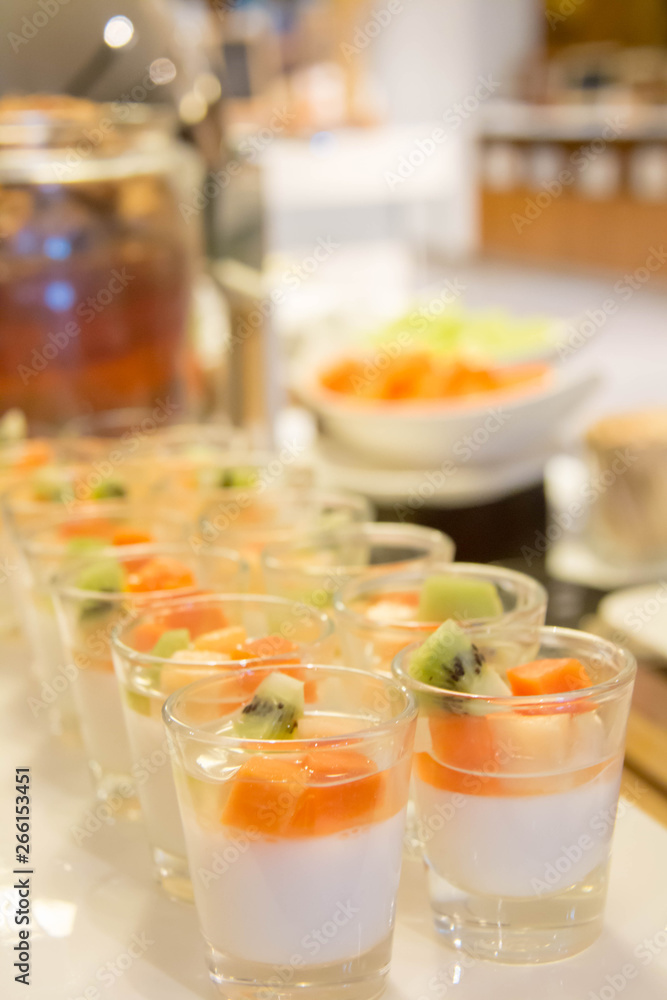 panacotta with mixed fresh fruit in glass panacotta with mixed fresh fruit in glass