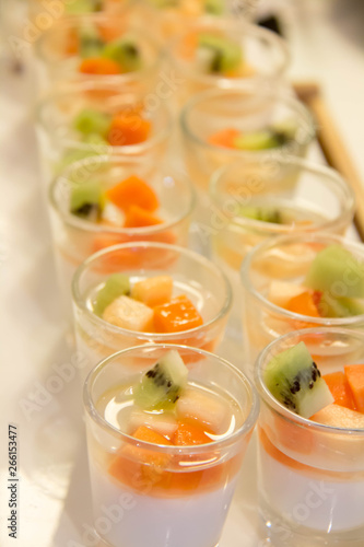  panacotta with mixed fresh fruit in glass