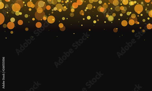 Abstact gold bokeh and sparkle droping on black background