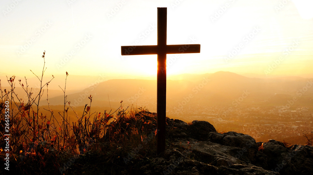 Holy Cross Standing in Mountain Landscape Scenery at Sunset Light