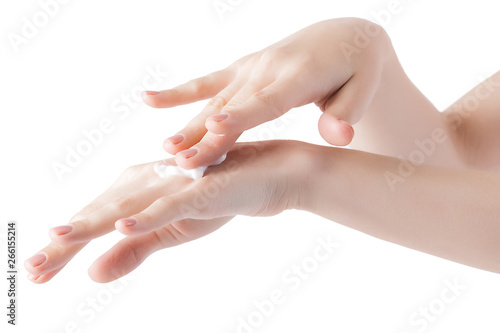 Young woman applying hand cream. Hands with moisturizing cream.