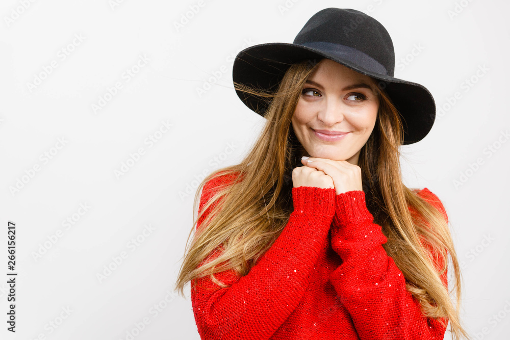 Smiling pretty girl with brown hair and black hat. Smiling pretty girl with brown hair and black hat.