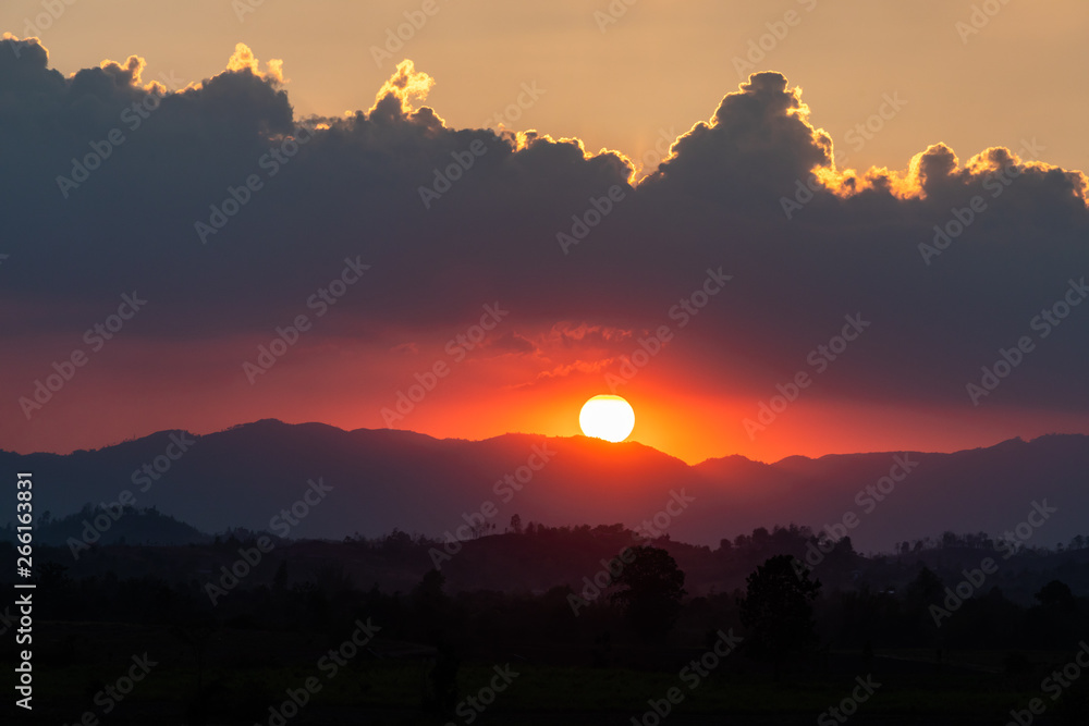 colorful sunset over the mountain at the borderdtown Mae Sot, Tak, Thailand