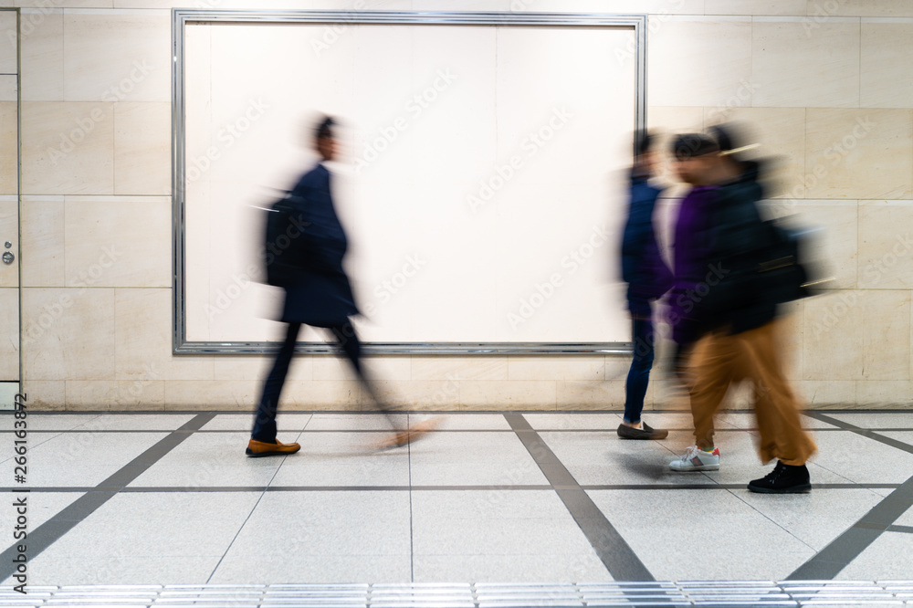 picture of people walking on a street in the city, with camera made motion blur effect picture of people walking on a street in the city, with camera made motion blur effect