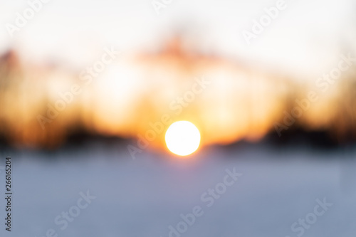 The spring sun setting behind the horizon in Aviators Park, the city of St. Petersburg, Russia (ID: 266165204)