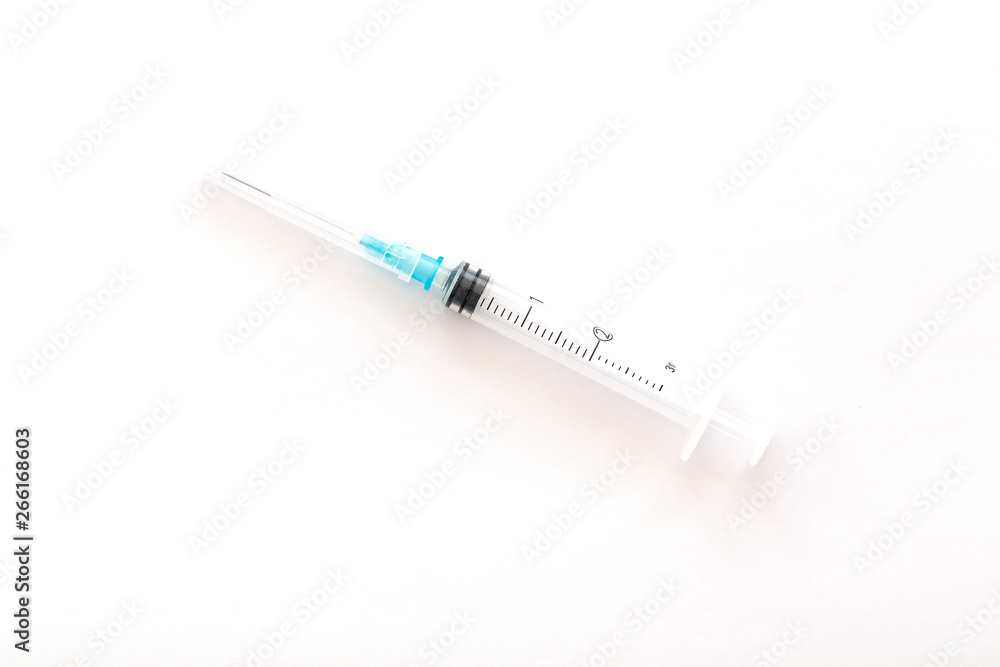 Empty syringe closeup isolated on white background. Empty syringe closeup isolated on white background.
