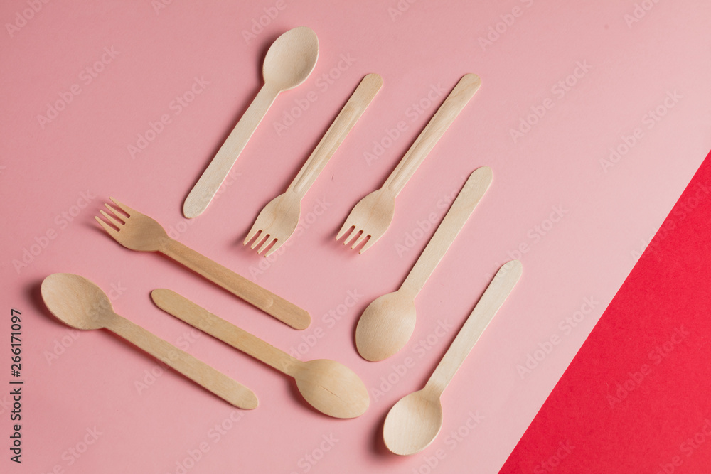 Various wooden spoons and forks. woodworker's items. top view photo Various wooden spoons and forks. woodworker's items. top view photo