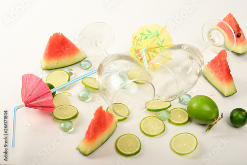 Fototapeta Naklejka Na Ścianę i Meble -  Watermelon, pieces of lemon on white background for preparing cool drinks.