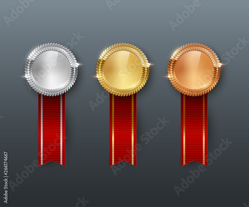 Vector gold, silver, bronze medals and vertical red ribbons isolated on gray background.