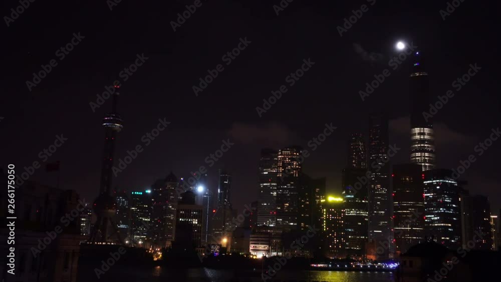 2 Shots: Pudong cityscape after lights turned off. After 10pm, flashing lights on Shanghai skyline go dark, with only darkness remaining. High exposure and low exposure shot of shut down Shanghai. 2 Shots: Pudong cityscape after lights turned off. After 10pm, flashing lights on Shanghai skyline go dark, with only darkness remaining. High exposure and low exposure shot of shut down Shanghai.