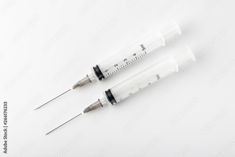 medical syringe with a long needle for the treatment of diseases and beauty shots on a white background medical syringe with a long needle for the treatment of diseases and beauty shots on a white background