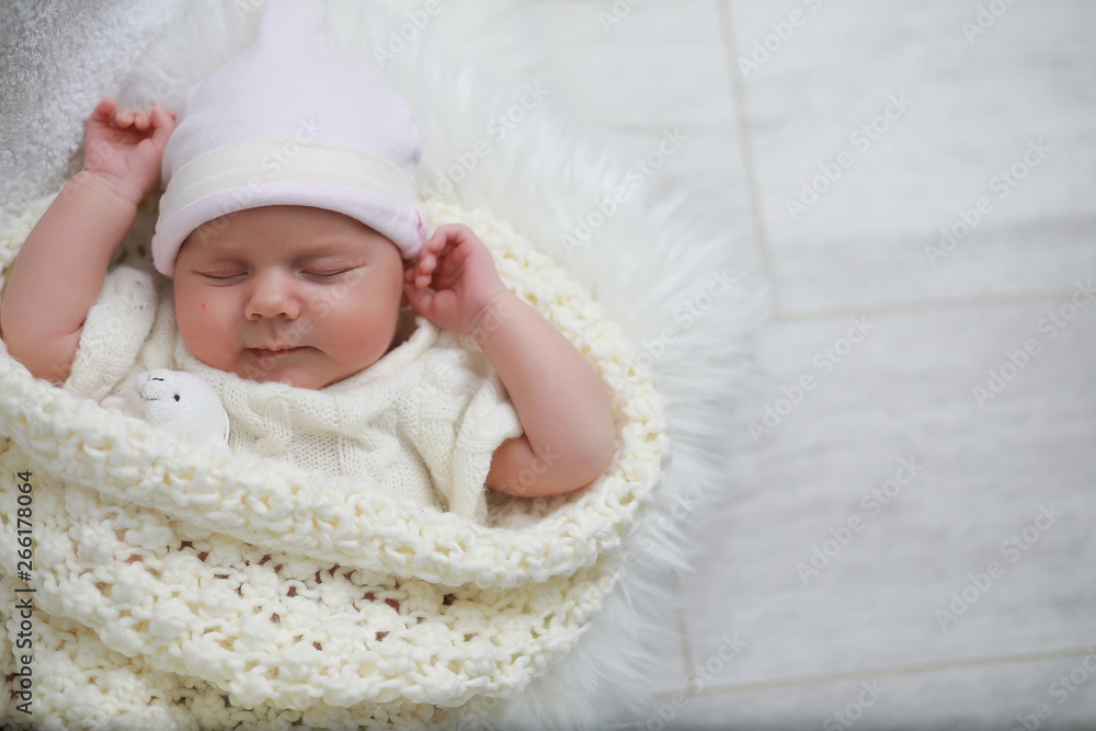 Baby newborn sleeping wrapped up in a blanket Baby newborn sleeping wrapped up in a blanket