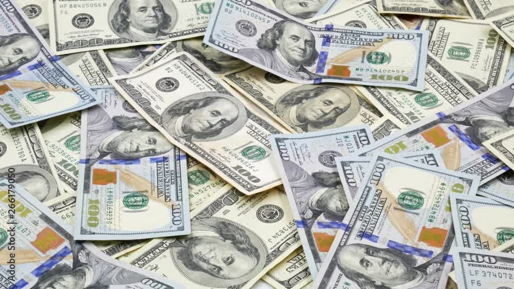 One hundred US banknotes. Cash. hundred dollar, 100 dollar One hundred US banknotes. Cash. hundred dollar, 100 dollar