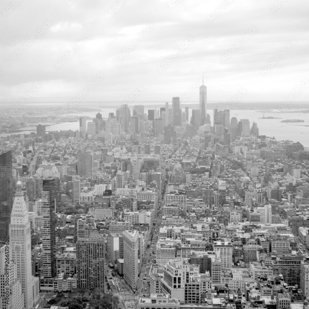 View of Lower Manhattan from the top of Empire State Building. Scanned film photo. Scanned black and white film photo. Captured with a medium format SLR camera from 1960s.