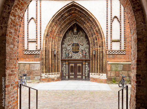 historic door of the church of St. Nicholas in Stralsund on the island of Rugen. Germany