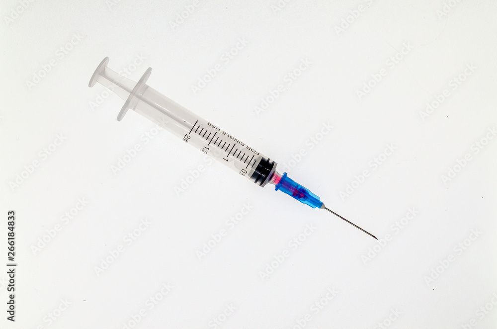 disposable medical syringe on white background disposable medical syringe on white background