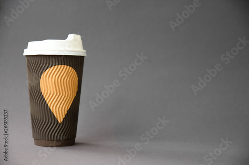 Cup of coffee on grey background. Art soft focus