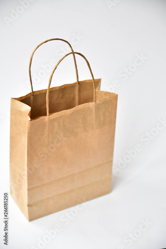 The paper bag on white background. Soft focus