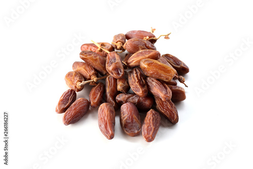 Creative layout made of dried date isolated on white background