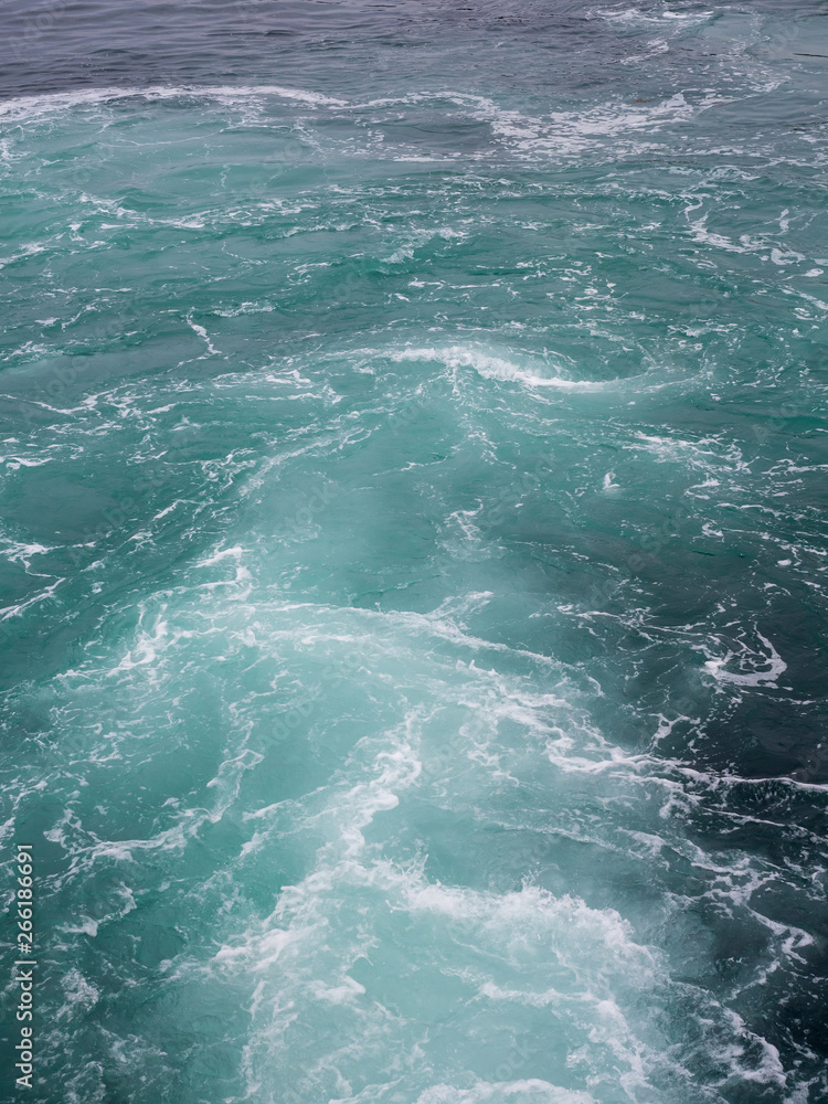 Water wave tail from ferry boat, Bergen Norway