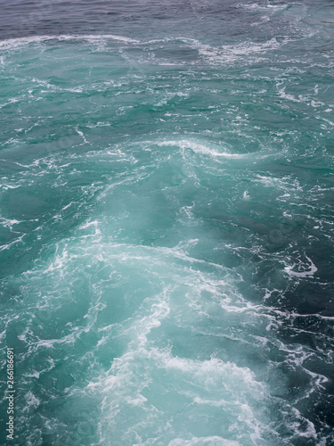 Fototapeta Naklejka Na Ścianę i Meble -  Water wave tail from ferry boat, Bergen Norway