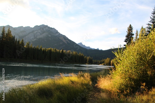 Evening Shadows On The Bow River, Banff National Park, Alberta
