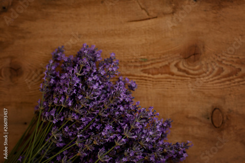 Lavender bouquet on old wooden background