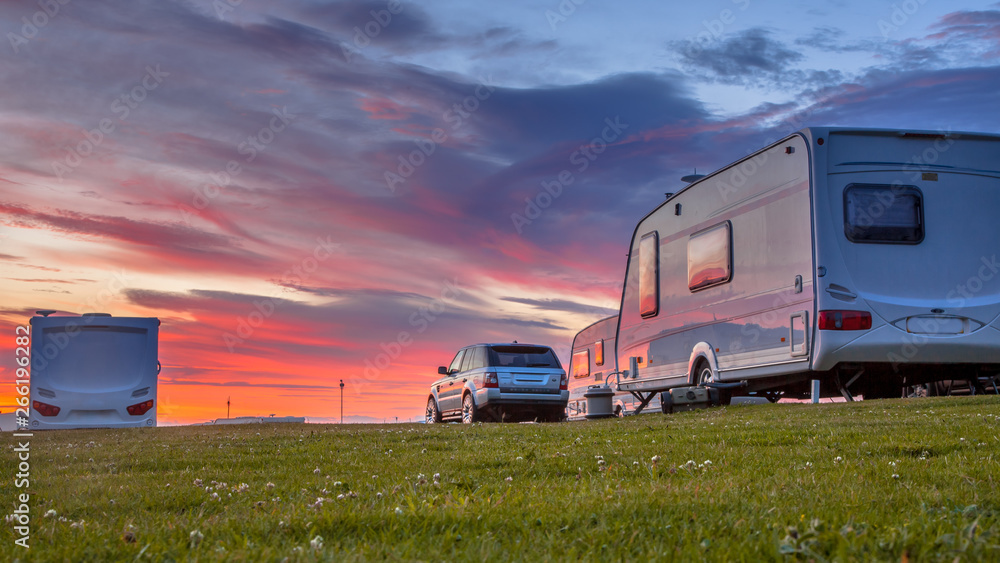 Camping caravans and cars  sunset