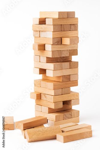 Close up blocks wood game jenga isolated on white background.