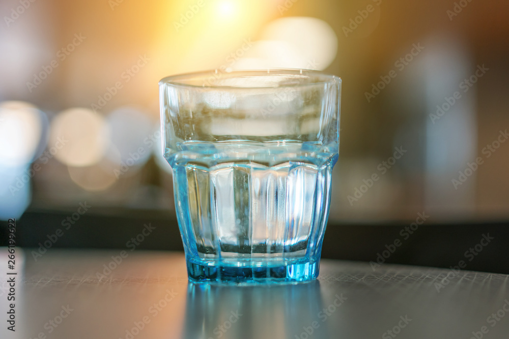 glass for water on the table of restaurant, close-up